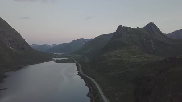 Midnight Sun in Napp/Flakdstad, Lofoten Islands, Norway Aerial Drone 4K