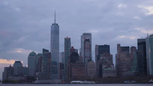 Manhattan Urban Skyline at Cloudy Evening. New York City. View From the Boat alt