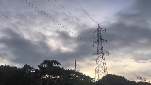 Electricity pylon or High-voltage transmission towers.