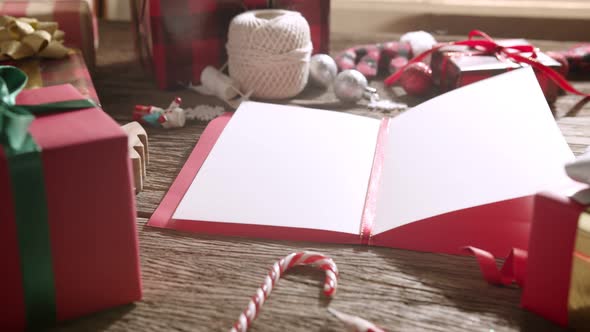 Top view of christmas greeting card on wooden table alt