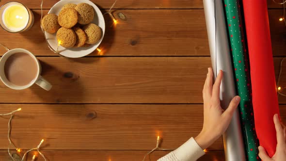 Woman Setting Stuff for Christmas Gifts Wrapping alt