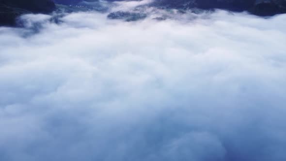 Beautiful Misty and Cloudy Fast Moving Aerial View