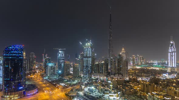 Dubai Downtown Cityscape with Burj Khalifa LightUp Light Show Aerial Timelapse alt