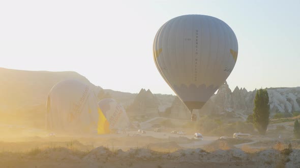 A huge air balloon lands. Air balloons landing site in Gereme.