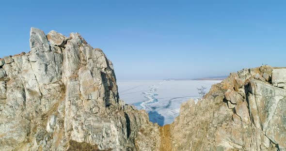  Winter Baikal Top View Drone Footage. Symbol of Lake Baikal Cape Burhan in Winter Time alt