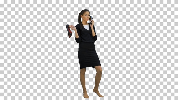 Young chatty woman using a shoe like a telephone, Alpha Channel