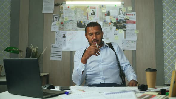 Frustrated Detective Smoking and Thinking alt