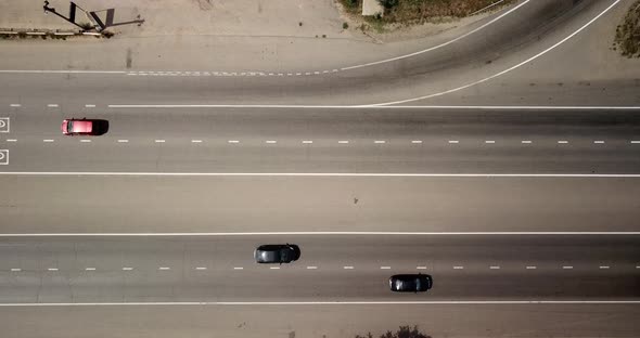 Top Down View of a Highway Road with Traffic Cars and Trucks on the Road alt