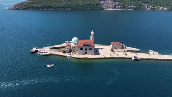 Catholic Church on a Small Island in Kotor Bay Perast Montenegro Drone Aerial alt