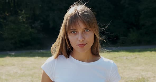 Wonderful Attractive Female with a Lovely Look and Natural Make Up Looking at Camera alt