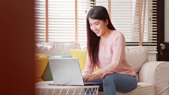 Entrepreneur of beautiful business asian young woman working online with laptop and celebrating alt