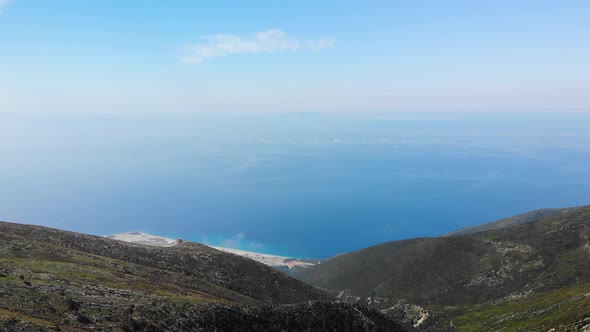 Aerial View From Llogara Pass to Albanian Riviera Beach Clouds and Ionian Sea Coastline