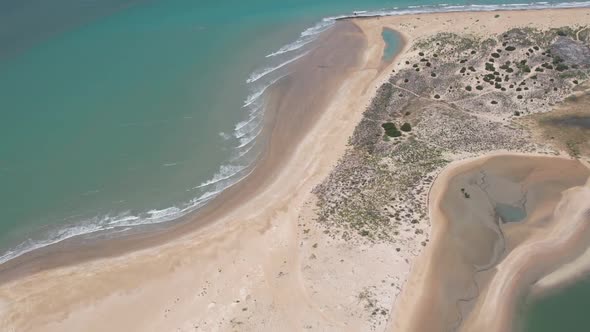 Aerial View Of A Hidden Paradise With Sandy Beach And Vegetation In Natal, Brazil. Drone Shot alt