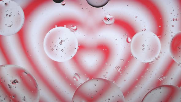 Abstract Valentines Day Hearts Background Oil and Water Slow Motion