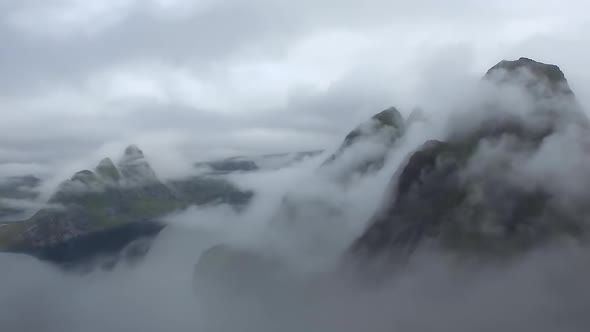 Beautiful landscape of Norway.Norway mountain on sunset clouds.Top point of view. Aerial view   alt