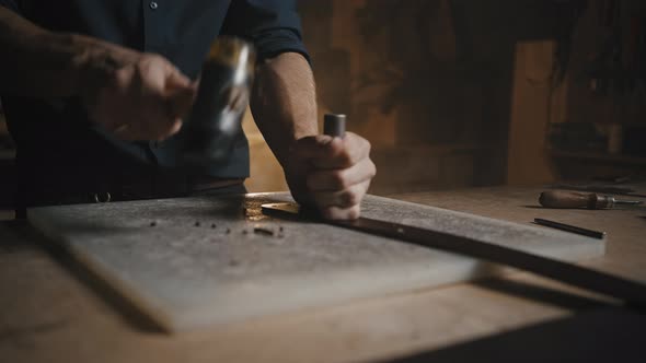 Man Hands Making Holes in Leather Belt with Professional Tools Creating Handmade Accessories at His alt