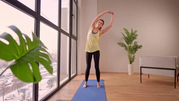 Female Doing Yoga Indoors alt