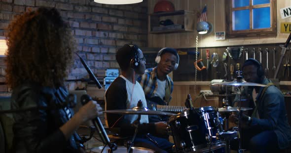 Young Musicians Playing in Garage alt