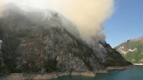 Wild Fire Over Mountain Forest Near Lake Piva in Montenegro in August of 2021 alt