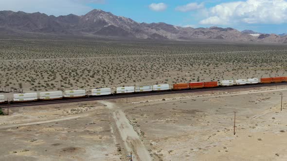 Cargo Locomotive Railroad Engine Crossing Arizona Desert Wilderness. USA alt