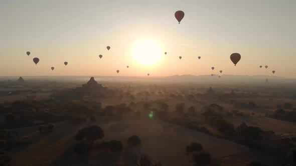 Aerial view of hot balloons in the Old Bagan temple site. alt