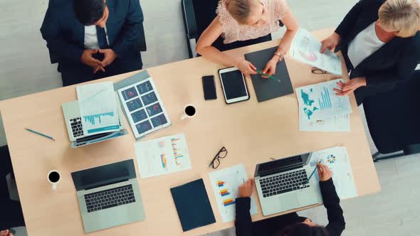 Business People Group Meeting Shot From Top View alt