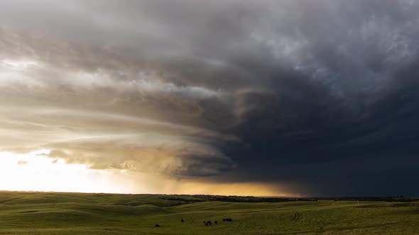 A Large Supercell Thunderstorm Spirals Across Tornado Alley During