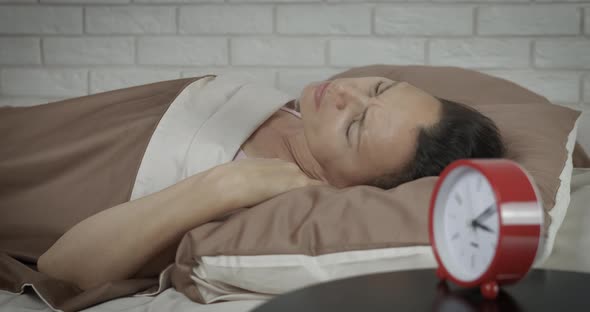 Depressed woman at night. alt