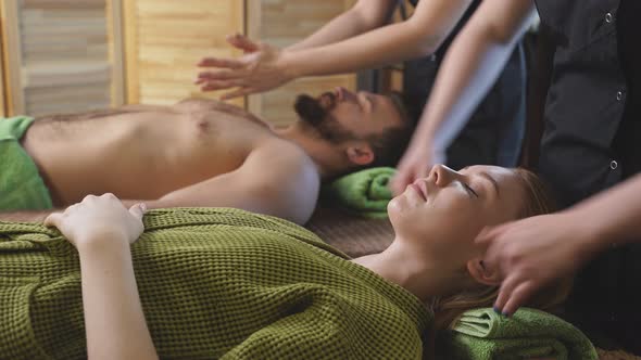 Relaxed Woman Lying on Spa Bed for Facial and Head Massage Spa Treatment By Skilled Massage