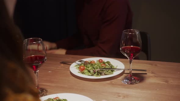 Surprised Woman Opening Gift a Chain Suspension alt