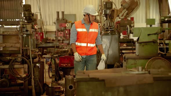 Factory engineers are inspecting machines inside an industrial plant,workplace safety idea