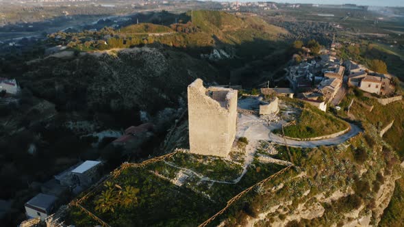 Ancient and Damaged Tower and Ruins of the Old Castle of Condojanni in Calabria alt