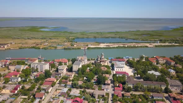 Aerial View Of Sulina City Harbor And The Danube Flowing Into The Black Sea alt