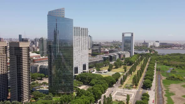 Aerial parallax shot of Puerto Madero waterfront and La Plata river on background alt