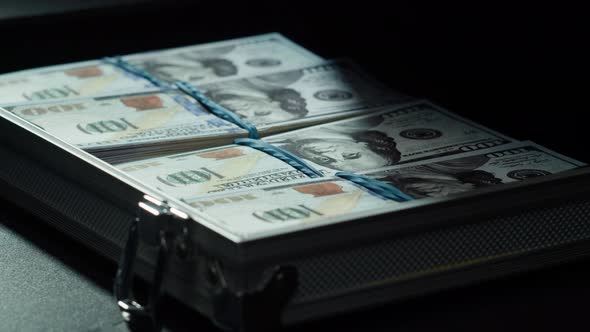 American Hundred Dollar Banknotes Money in Metallic Suitcase alt