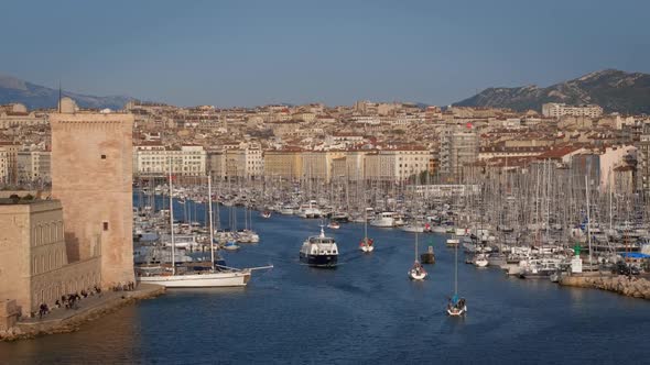 Yachts Coming To Marseille Old Port on Sunset. Marseille, France