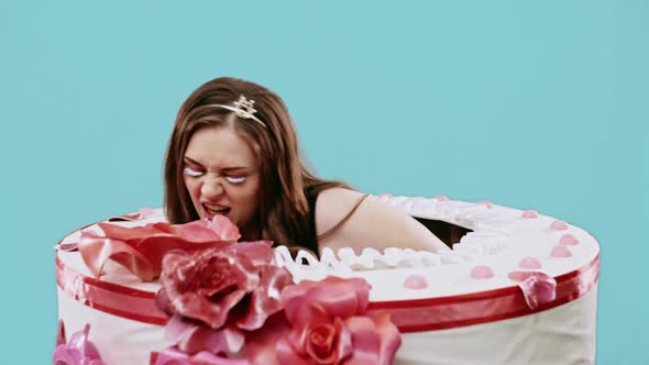 Overweight Woman Dancing in Cake