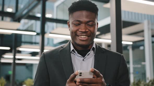 Happy Smiling African Guy American Man Businessman Boss Employee Holding Modern Wireless Device alt