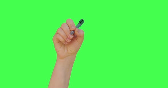 Female hand writing check mark symbol with pen, President election positive vote, Green screen alt