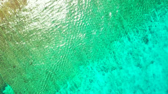 Aerial top down scenery of tropical coastline beach vacation by clear ocean and white sandy backgrou alt