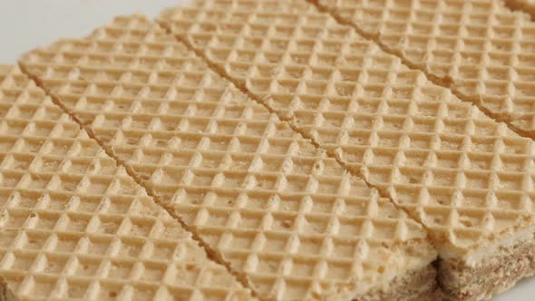 Waffle surface pattern of sweet thin biscuit close-up 4K 21560p 30fps UltraHD slow pan footage - Isr