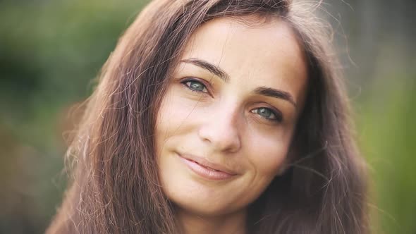 Beautiful Caucasian Woman Smiling at Camera.