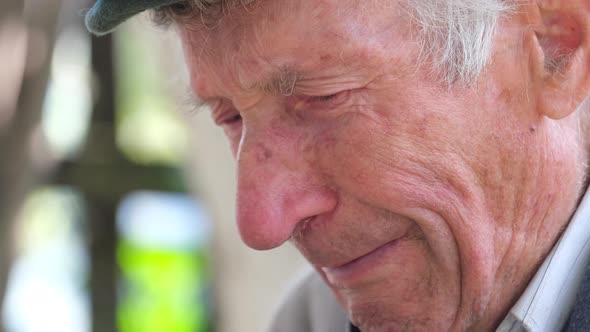 The Old Man is Crying He is in Despair He Lost His Home Because of the War in Ukraine alt