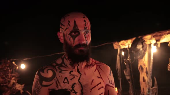 Viking is a Brutal Male Warrior of Dangerous Appearance Waiting Enemy Near Fire alt