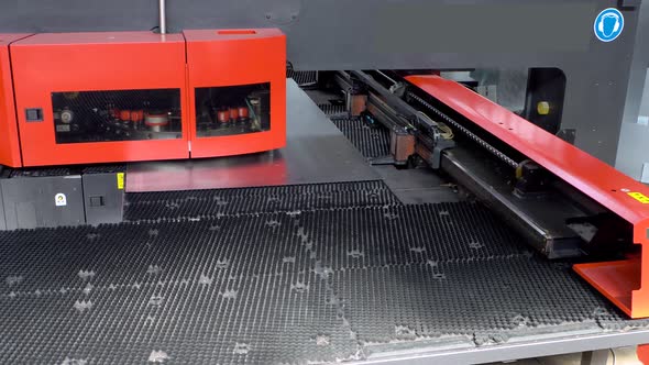 Rotation CNC Punching Nibbling Machine in Action alt