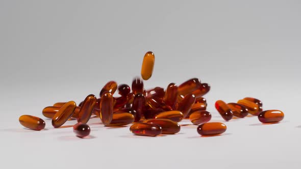 Vitamins and supplements fall in slow motion alt
