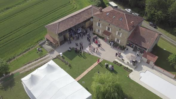 Aerial view of medieval french castle wedding party house on nature green field Sarremezan France alt