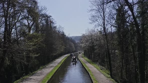 A Narrow Boat heading up stream after Crossing the Pontcysyllte Aqueduct, famously designed by Thoma alt