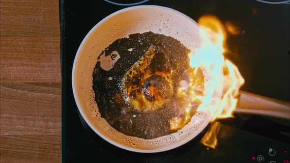 Fire Burns in a Pan