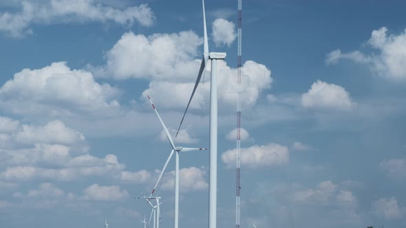Wind Turbines Against a Cloudy Sky
